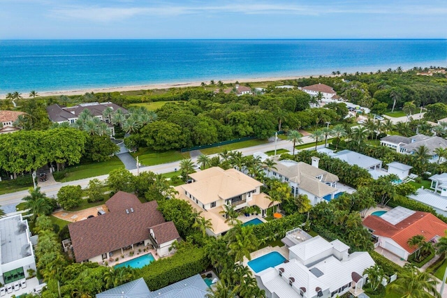 aerial view with a beach view, a residential view, and a water view