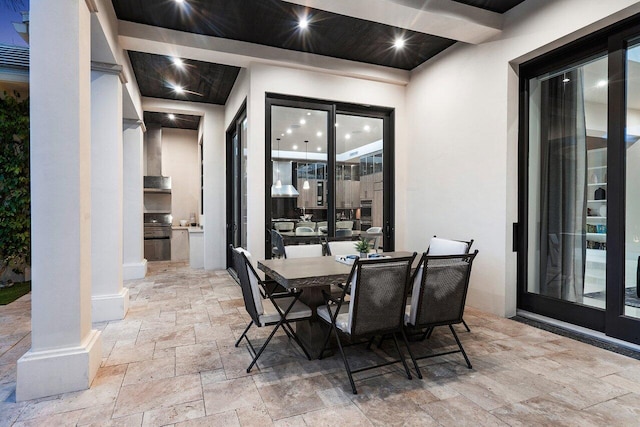 view of patio / terrace featuring outdoor dining space and exterior kitchen