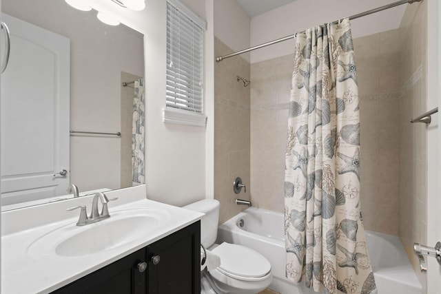 full bathroom with vanity, shower / bathtub combination with curtain, and toilet