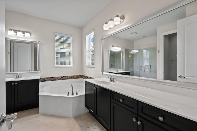 bathroom with vanity, separate shower and tub, and tile patterned floors