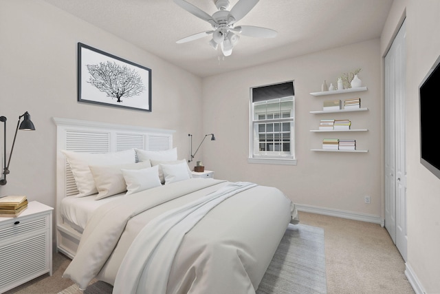 bedroom featuring a closet, carpet floors, and ceiling fan