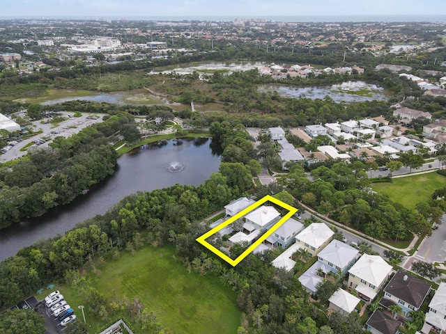 birds eye view of property featuring a water view