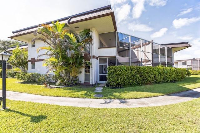 view of front of home with a front yard