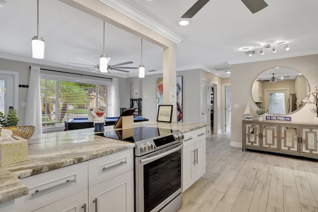 kitchen featuring electric stove, light stone counters, light hardwood / wood-style floors, and white cabinets