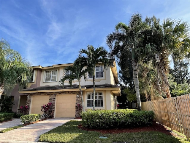 view of front of property featuring a garage