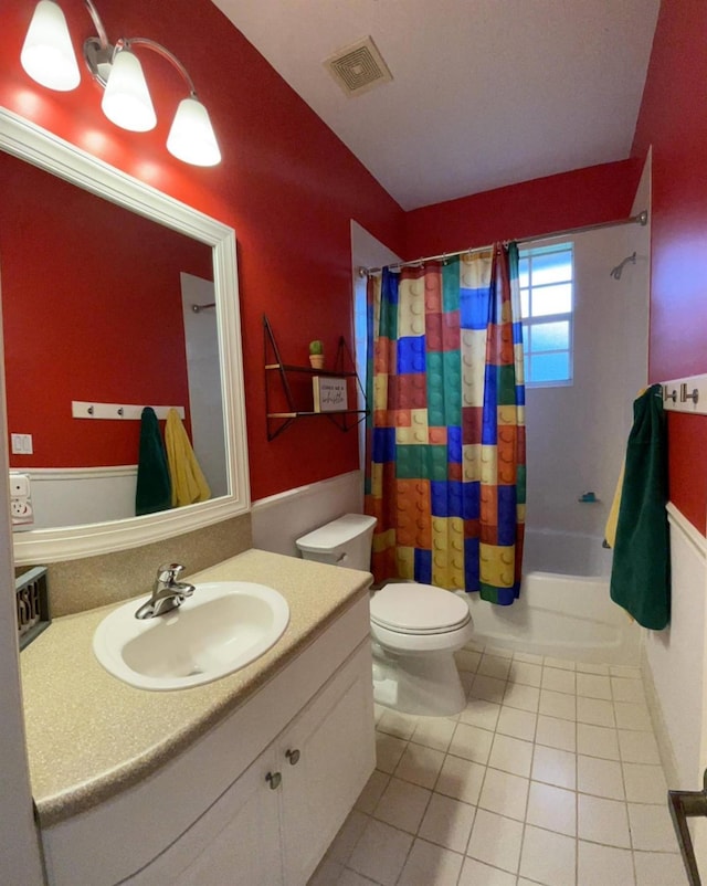 328 SE Bloxham Way, Stuart, FL 34997 - full bath featuring tile patterned floors, vanity, toilet, shower / bathtub combination with curtain, and lofted ceiling