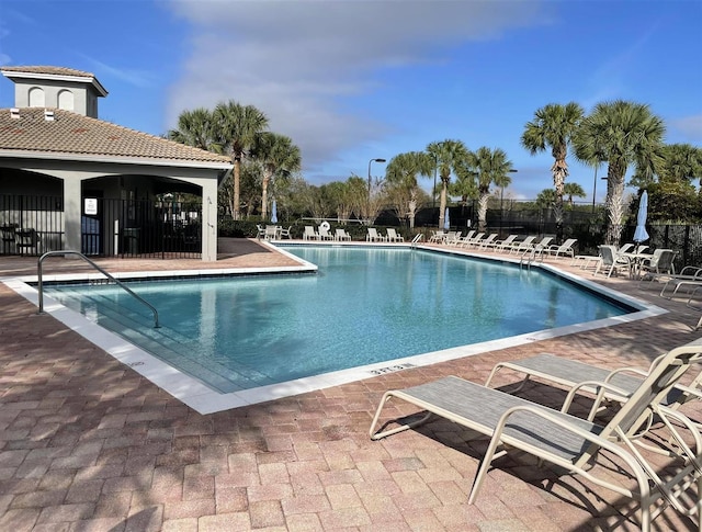 328 SE Bloxham Way, Stuart, FL 34997 - community pool featuring a patio area