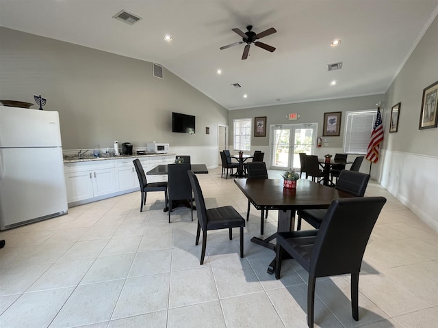 328 SE Bloxham Way, Stuart, FL 34997 - dining space with light tile patterned floors, lofted ceiling, recessed lighting, and a ceiling fan