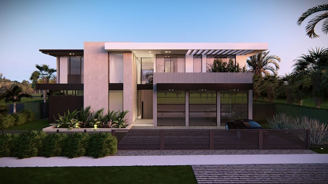 exterior space featuring fence and a balcony