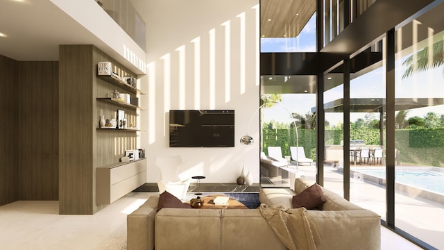 living room featuring wood walls and a towering ceiling