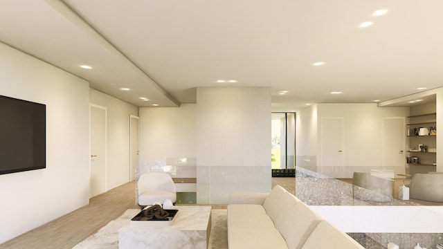 living room with wood finished floors and recessed lighting