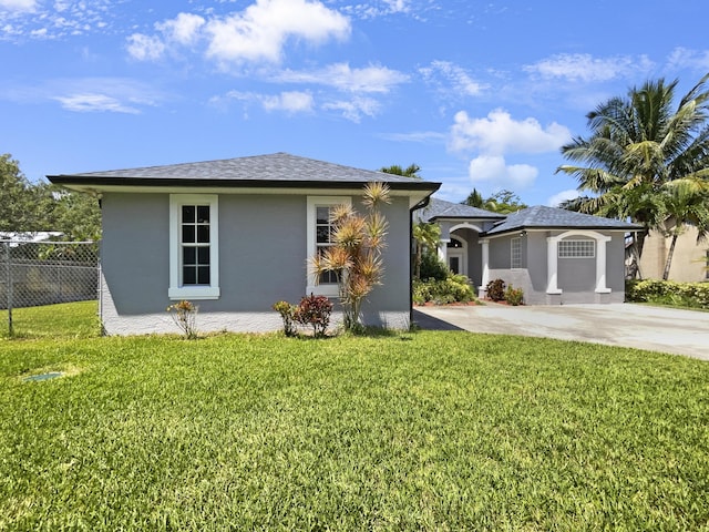 view of front of home with a front yard