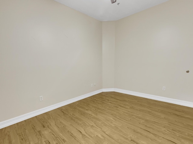 unfurnished room featuring light hardwood / wood-style flooring