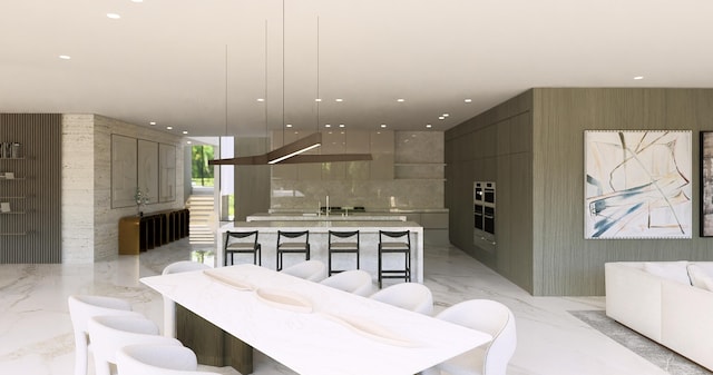 kitchen with a large island with sink, a sink, recessed lighting, modern cabinets, and marble finish floor
