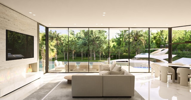 living room featuring expansive windows and plenty of natural light
