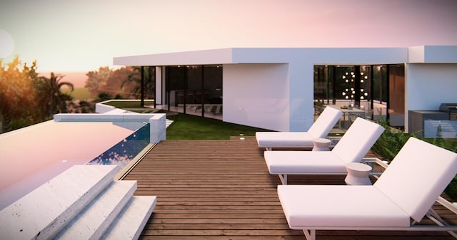 view of balcony at dusk