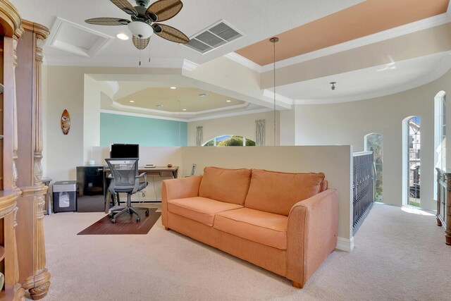 living room featuring arched walkways, a notable chandelier, crown molding, a decorative wall, and a high ceiling