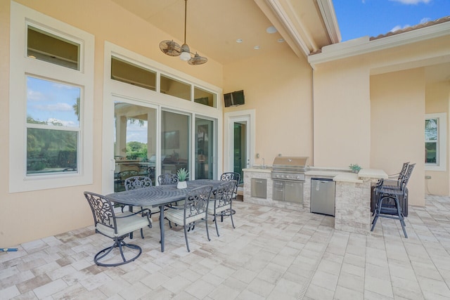 view of patio with exterior kitchen and grilling area