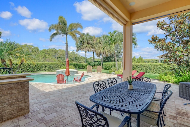 view of patio / terrace featuring a fenced in pool