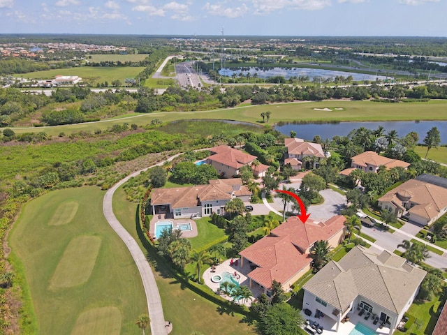 birds eye view of property featuring a residential view and a water view