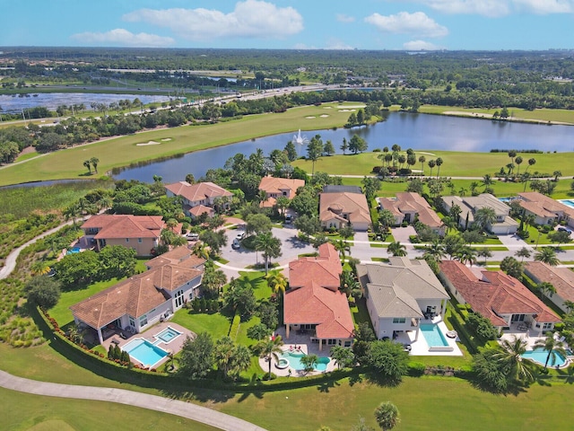 aerial view with a water view and a residential view