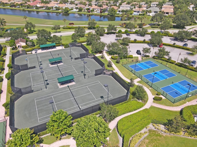 birds eye view of property featuring a water view