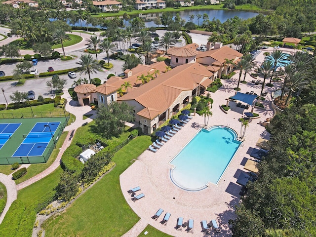 birds eye view of property featuring a water view