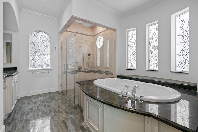 bathroom with hardwood / wood-style floors, plus walk in shower, ornamental molding, and vanity