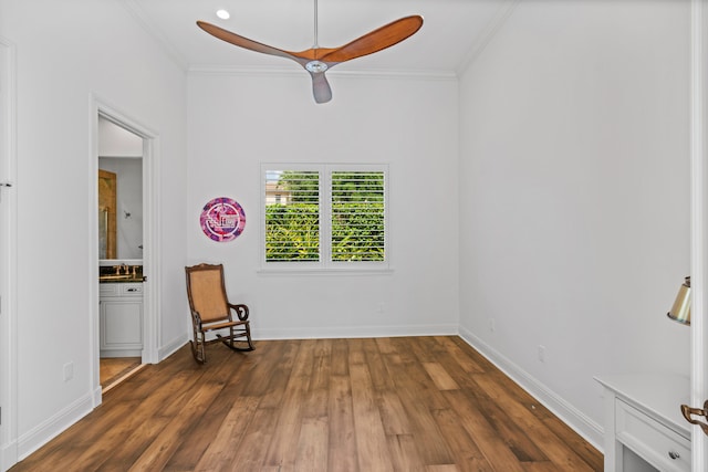 unfurnished room featuring sink, ceiling fan, ornamental molding, and dark hardwood / wood-style floors