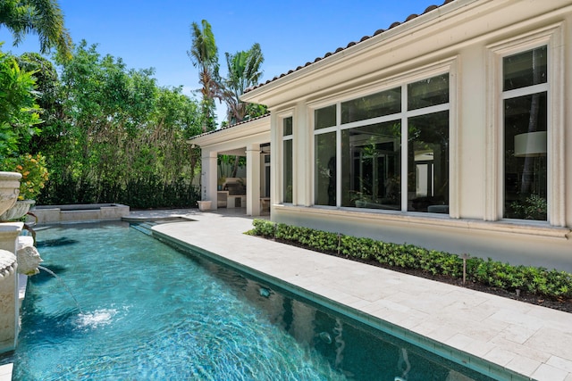 view of pool with a patio