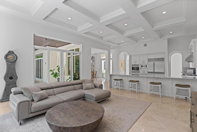 living room featuring light tile patterned floors, coffered ceiling, and beamed ceiling