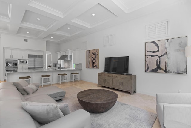 tiled living room with beamed ceiling, coffered ceiling, and a high ceiling