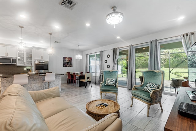 living room with light tile patterned floors