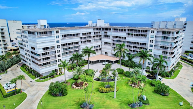 view of property with a water view