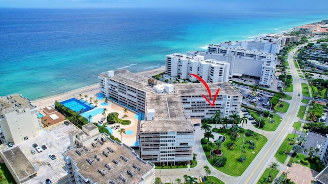 birds eye view of property featuring a water view