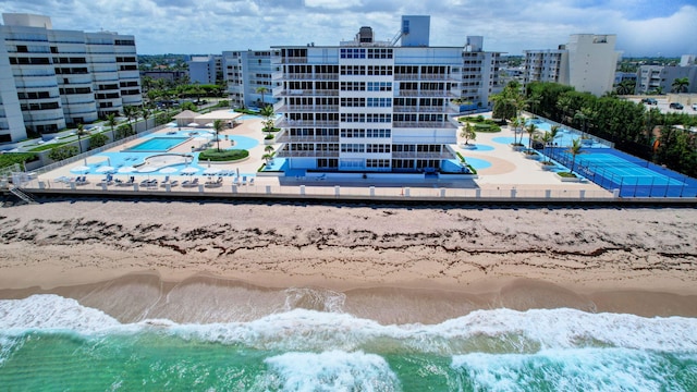 bird's eye view featuring a view of the beach and a water view