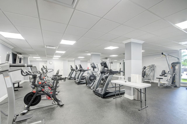 workout area featuring a paneled ceiling