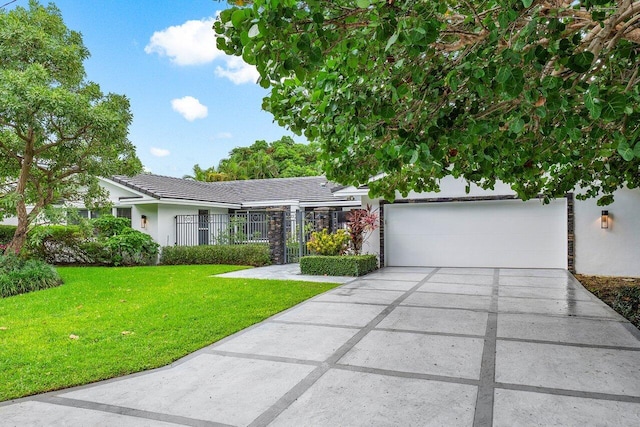 single story home featuring driveway, a tiled roof, an attached garage, fence, and a front lawn