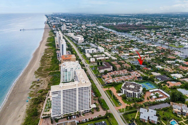 aerial view with a view of the beach and a water view