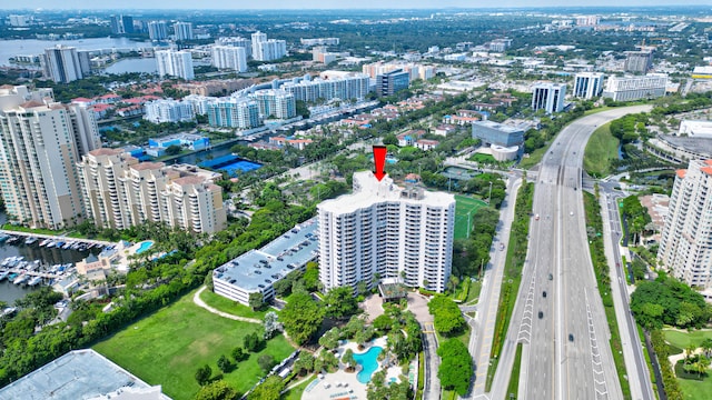 drone / aerial view featuring a water view