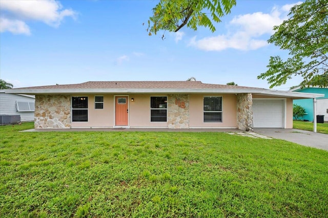 ranch-style house with central air condition unit, a front yard, and a garage