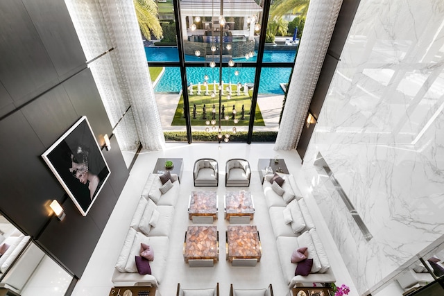 living room featuring an inviting chandelier