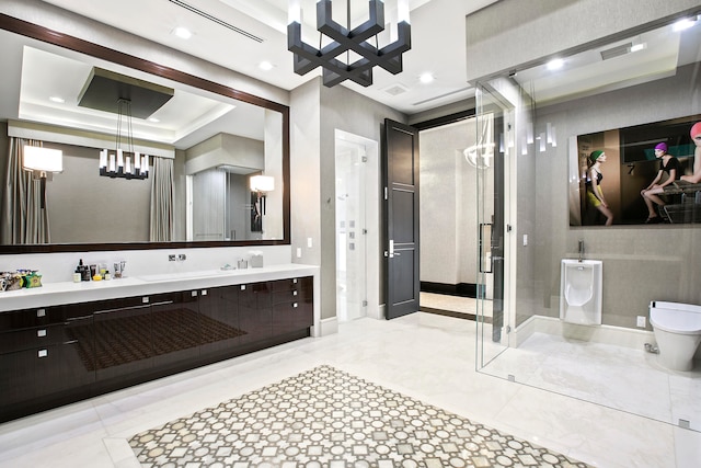 bathroom featuring a raised ceiling, a chandelier, toilet, vanity, and tile patterned floors