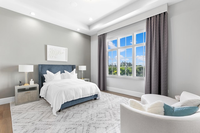 bedroom featuring hardwood / wood-style floors