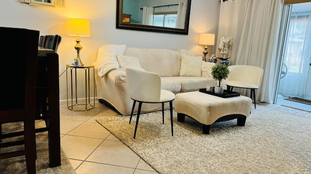 living area featuring tile patterned floors