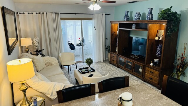 living room featuring ceiling fan