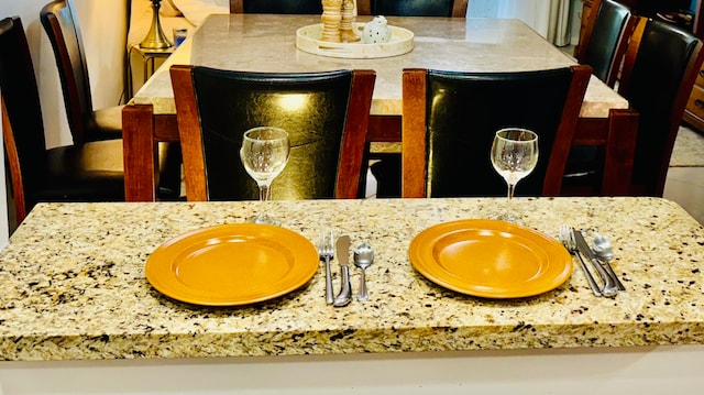 interior details featuring light stone countertops