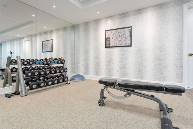 exercise room with carpet floors