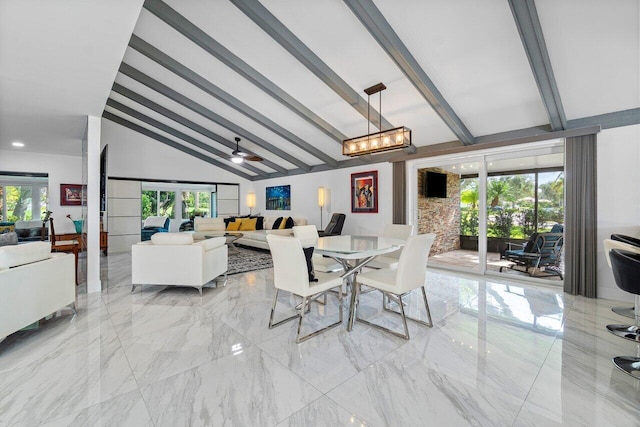 dining area featuring ceiling fan with notable chandelier and lofted ceiling with beams