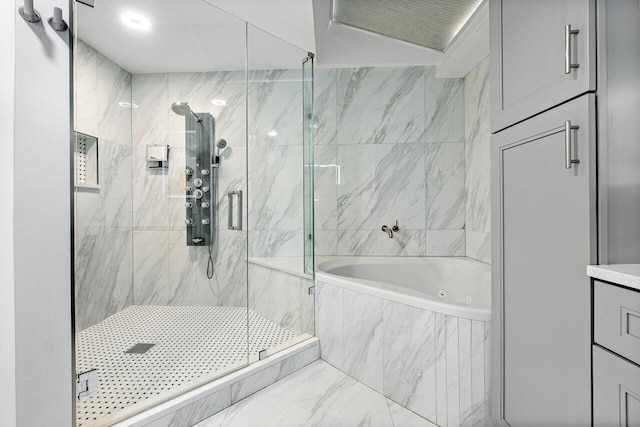 bathroom with separate shower and tub and vanity